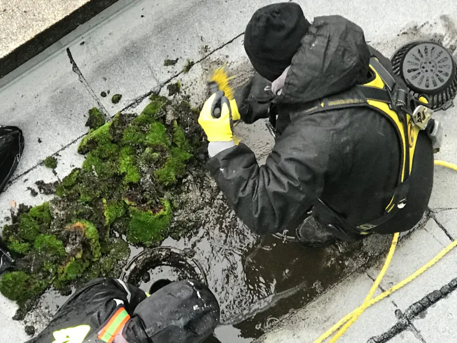 James King crew inspecting details on a commercial rooftop